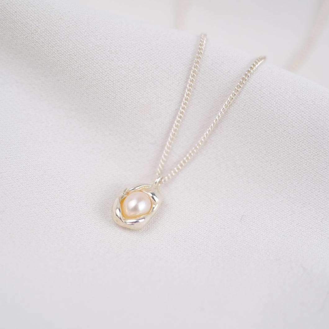 Embraced Pearl Pendant Necklace